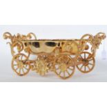 A 20th Century gilt metal tureen / centrepiece in the form of a carriage raised on wheels having