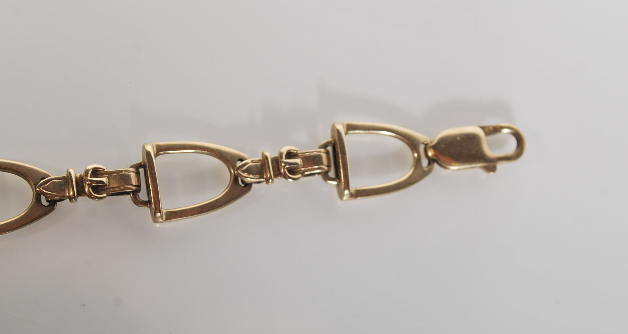 A 9ct Gold hallmarked designer bracelet by Rosemary Hetherington, the bracelet designed as Horse - Image 4 of 6