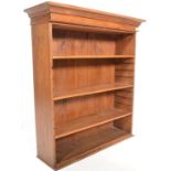 A Victorian 19th century solid oak open window bookcase cabinet. Raised on a plinth base with open
