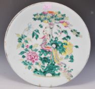 A large 19th Century Chinese Canton wall charger plate of round form having a celadon ground,