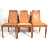 A set of six vintage retro 20th Century teak wood framed dining chairs having square panelled back