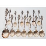 A selection of Norwegian T H Marthinsen silver spoons hall having highly decorative handles with