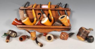 A large selection of vintage 20th Century smoking pipes to include briar, meerschaum calabash, a