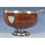 A vintage 20th Century wooden centrepiece pedestal bowl having silver white metal mounts, with an