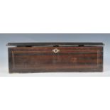 A 19th Century mahogany cased cylindrical music box. The case itself having a brushed coromandel