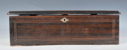 A 19th Century mahogany cased cylindrical music box. The case itself having a brushed coromandel