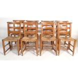 A set of 8 Victorian 19th century country beech wood chapel chairs. Raised on turned legs with