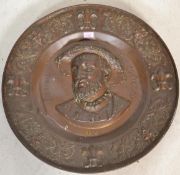 A 19th century large French copper wall charger plate commemorating King Francois I having a