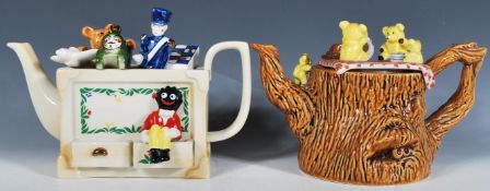A pair of Cardew collectors novelty teapots to include a ' Toy Box ' teapot modelled with various