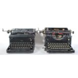 Two vintage 20th Century circa 1930's industrial Royal American made typewriters, one with retailers