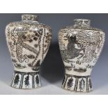 A pair of early 20th Century oriental vase of Meiping form having Greek key decorated rims with