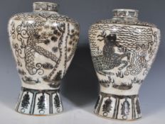 A pair of early 20th Century oriental vase of Meiping form having Greek key decorated rims with