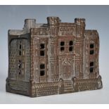 A 19th Century Victorian cast iron money box of architectural building form County Bank above the