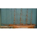 A large 20th Century model ship of 'The Master' of wooden construction along with a smaller wooden