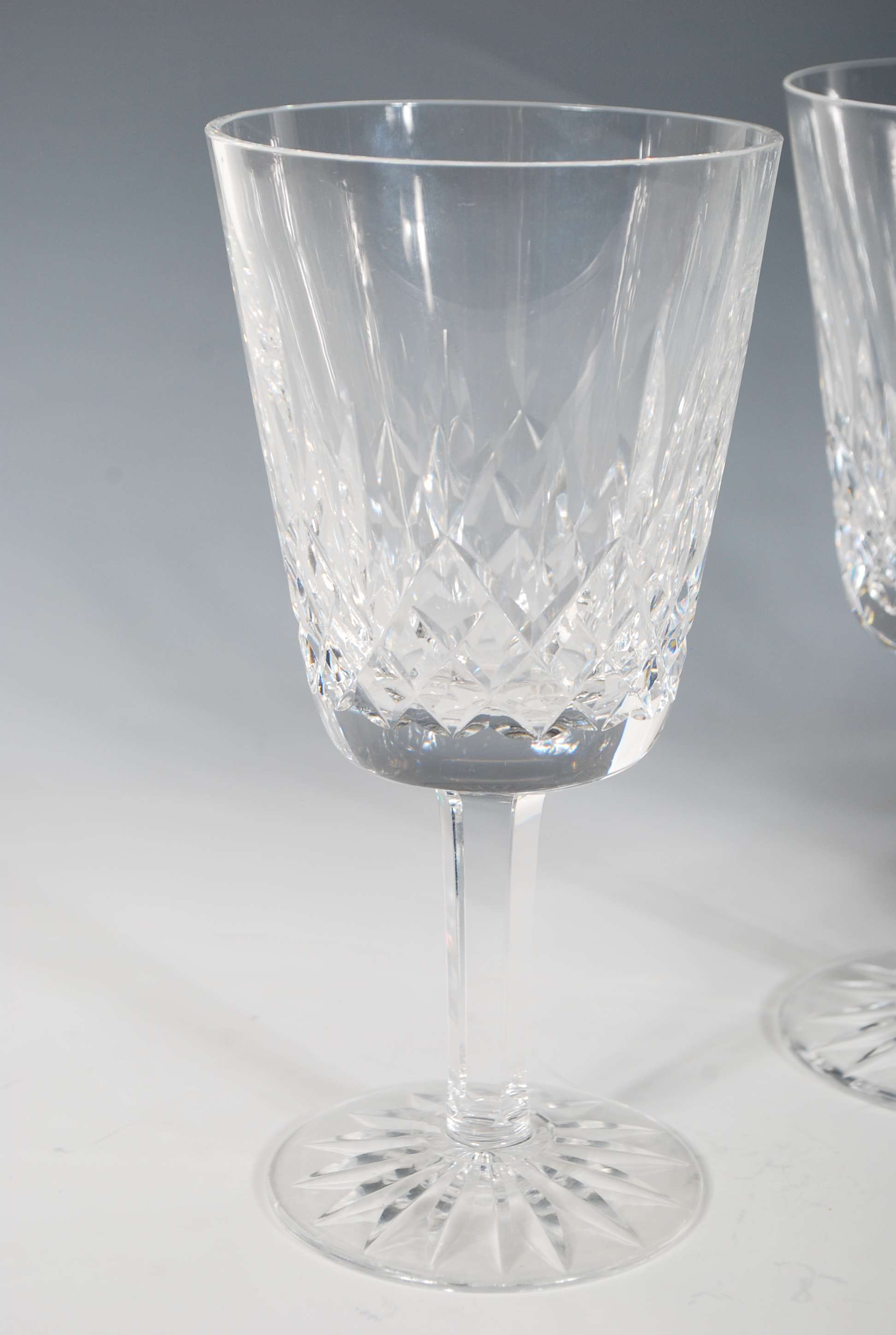 A set of four Waterford crystal cut glass goblet / wine glasses in the 'Lismore' pattern having - Image 3 of 6