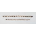 Two stamped 925 silver chain link bracelets to include a flat faceted link bracelet and an unusual