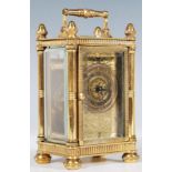 A vintage brass miniature Carriage Clock of five-glass form, possibly French, brass chase