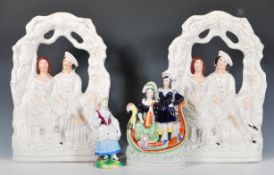A group of three 19th Century Victorian Staffordshire figures to include a pair of wedding /