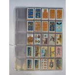 A set of vintage 100 gallaher's Great War Series cigarette cards no. 101-200 set within a plastic