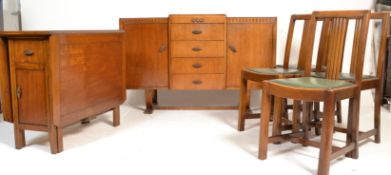 A 1930's Art Deco dining suite consisting of an oak sideboard having a central bank of four