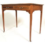 An Edwardian mahogany inlaid writing table desk. Raised on square tapering legs with drawers to