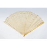 A 19th Century ladies fan believed Dieppe. The fan made from ivory having thirty (30) blades tied