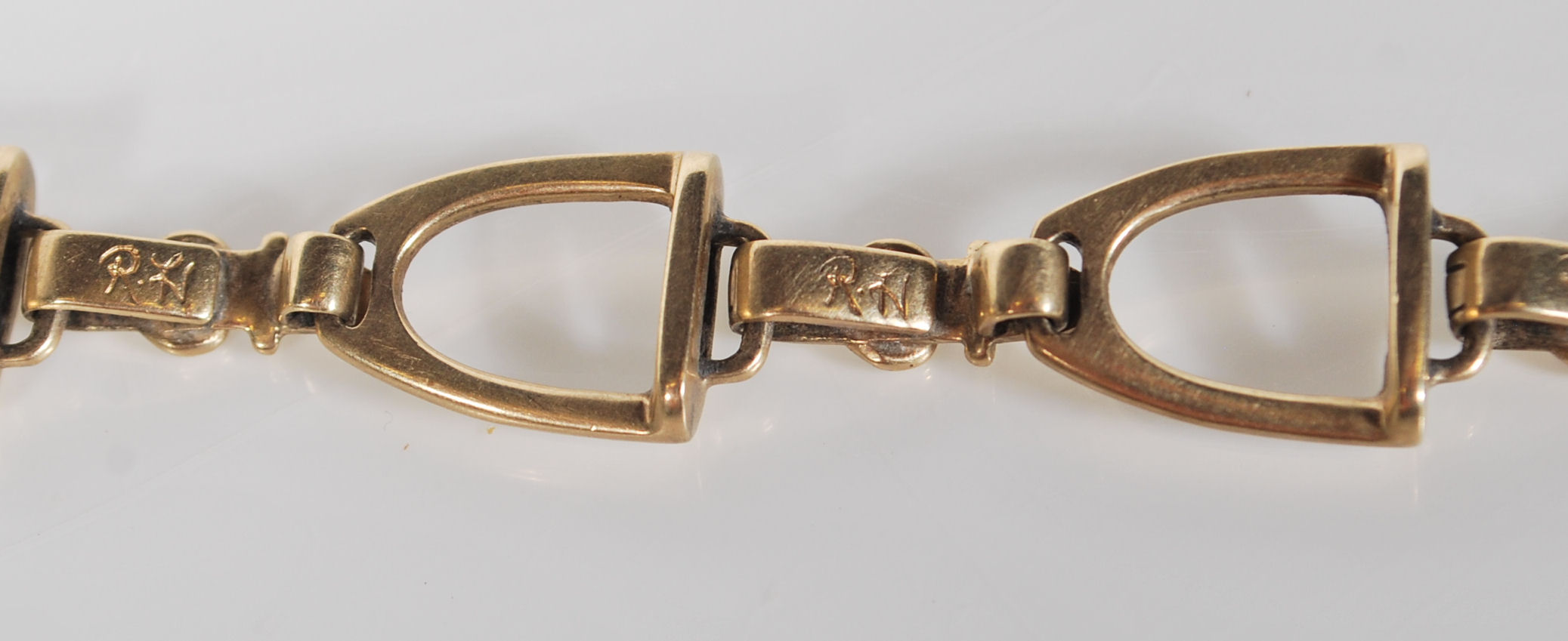 A 9ct Gold hallmarked designer bracelet by Rosemary Hetherington, the bracelet designed as Horse - Image 5 of 6