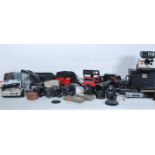 A collection of vintage film cameras and equipment to include a cased Polaroid land Camera, a