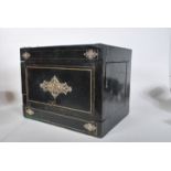 A 19th Century ebonised wood travelling tantalus having decorative silver plated mounts featuring