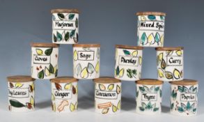 Geoffrey Maund - A selection of vintage ceramic spice jars having hand painted name labels decorated