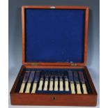 An early 20th Century Edwardian mahogany cased cutlery service consisting of twelve knifes and