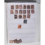 An album of British stamps dating from the 19th Century Victorian era to include 1881 one penny