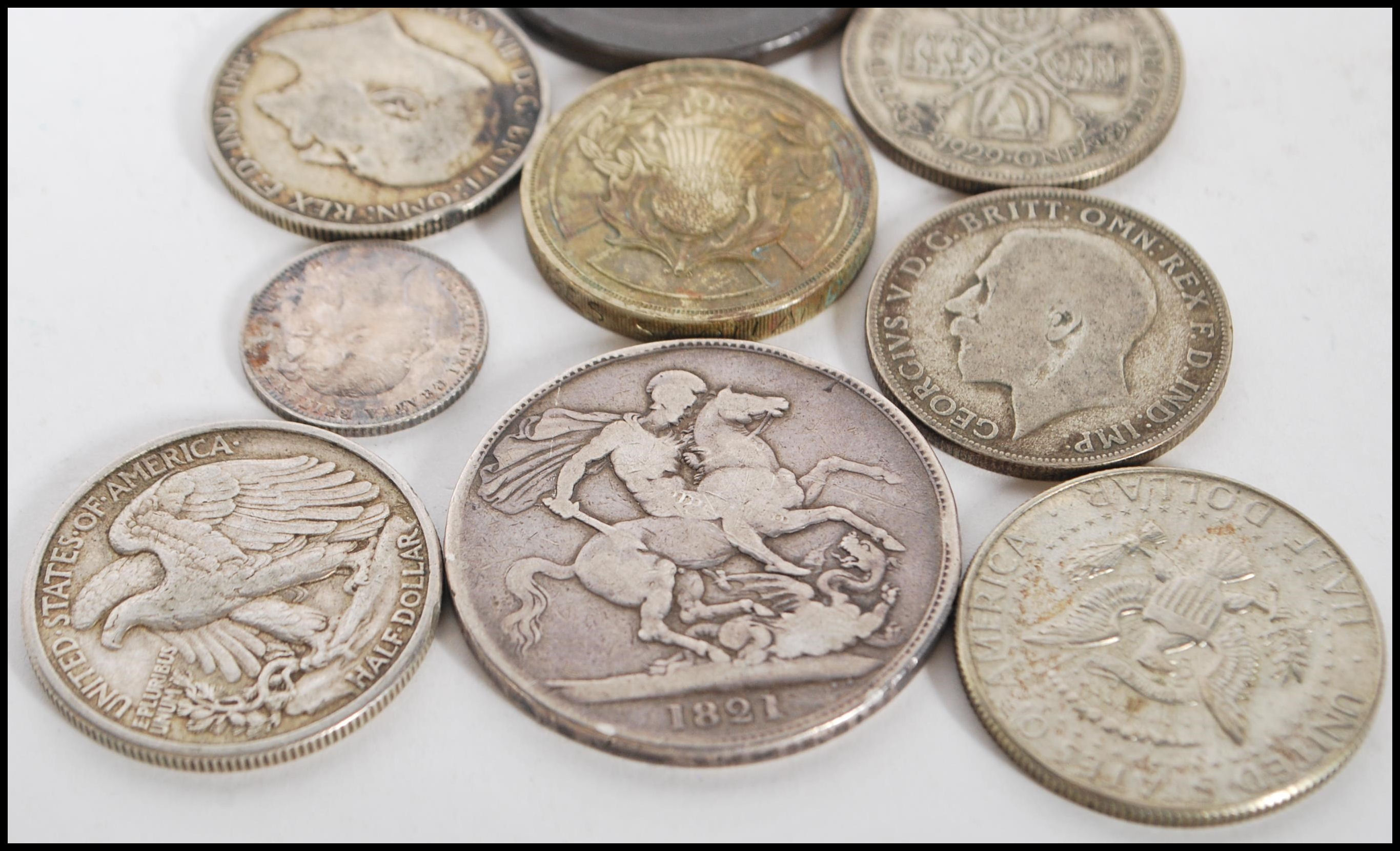 A collection of coins dating from the early 19th Century to include a George IV 1821 crown with - Image 2 of 6