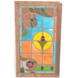 A vintage 20th Century lead lined stain glass window of rectangular form having multi coloured