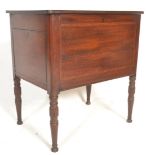 A Victorian 19th century mahogany line inlaid wine cooler. Raised on reeded and turned legs with a