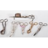 A small group of mixed scissors dating form the early 20th Century to include a pair of Walker and