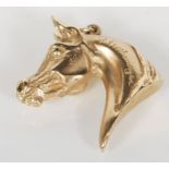 A limited edition 9ct gold hallmarked pendant modelled as a horses head, 82/250 by Rosemary