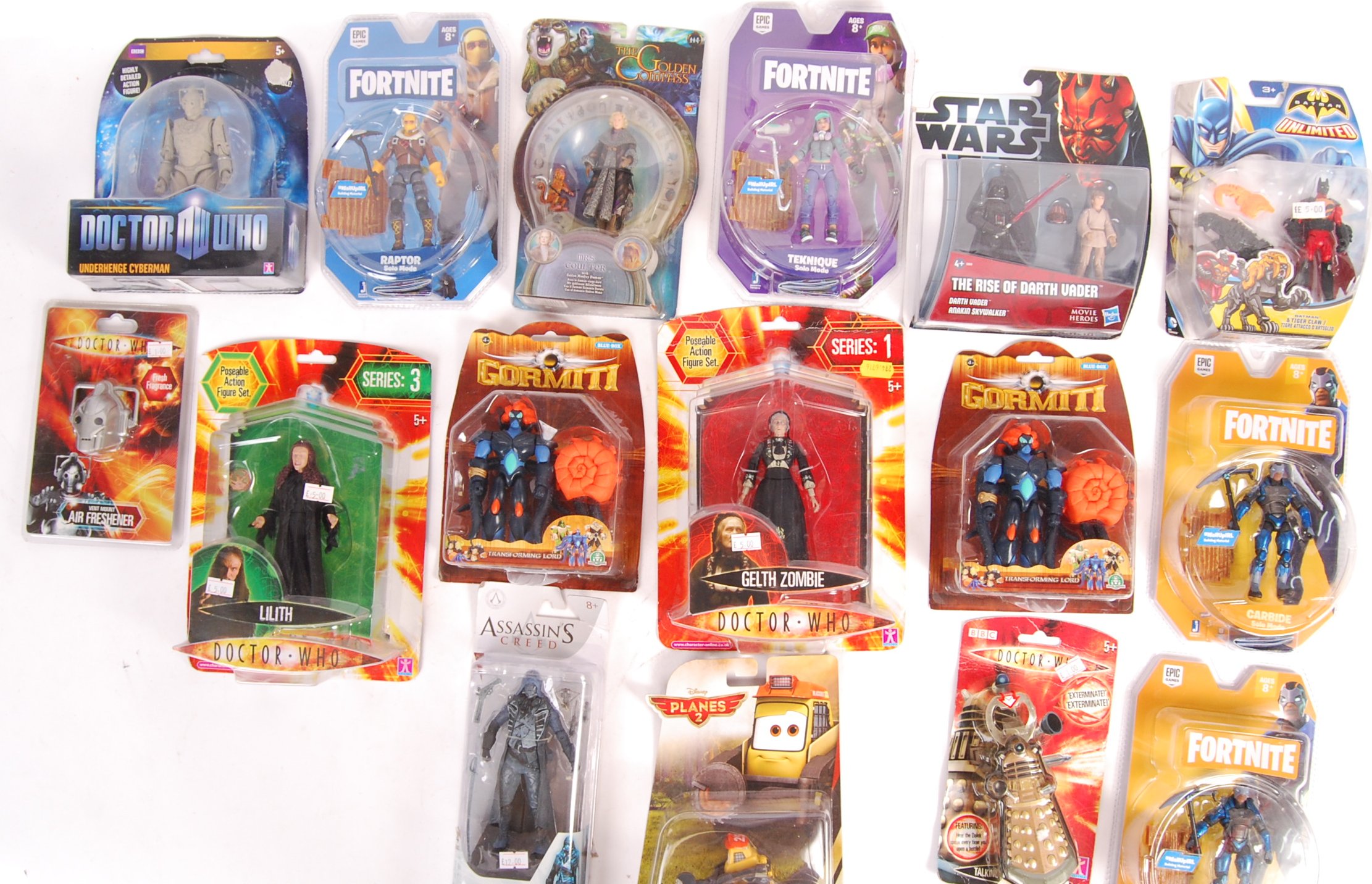 COLLECTION OF ASSORTED CARDED ACTION FIGURES