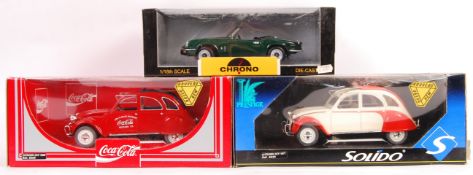 COLLECTION OF BOXED 1/18 SCALE DIECAST MODELS.