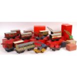 ASSORTED BOXED 0 GAUGE RAILWAY TRAINSET COACHES, BUFFERS & CRANES