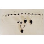 A stamped 925 silver demi parure jewellery set con