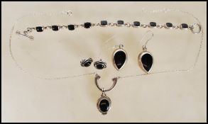 A stamped 925 silver demi parure jewellery set con