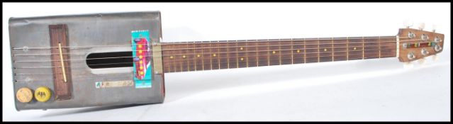 A 20th Century retro Afri-Can electric guitar, the