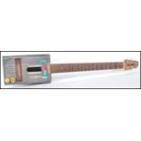 A 20th Century retro Afri-Can electric guitar, the