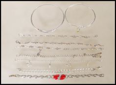 A selection of stamped silver bracelets to include