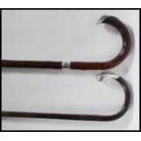Two 20th Century walking stick canes to include a