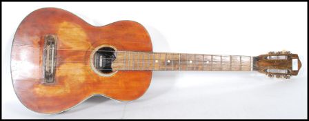 A 20th Century Columbia Junior six string acoustic