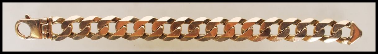 A stamped 375 9ct gold large flat link bracelet ha
