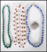 A group of three 20th Century beaded necklaces to