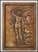 A 20th Century cast bronze wall plaque having an e